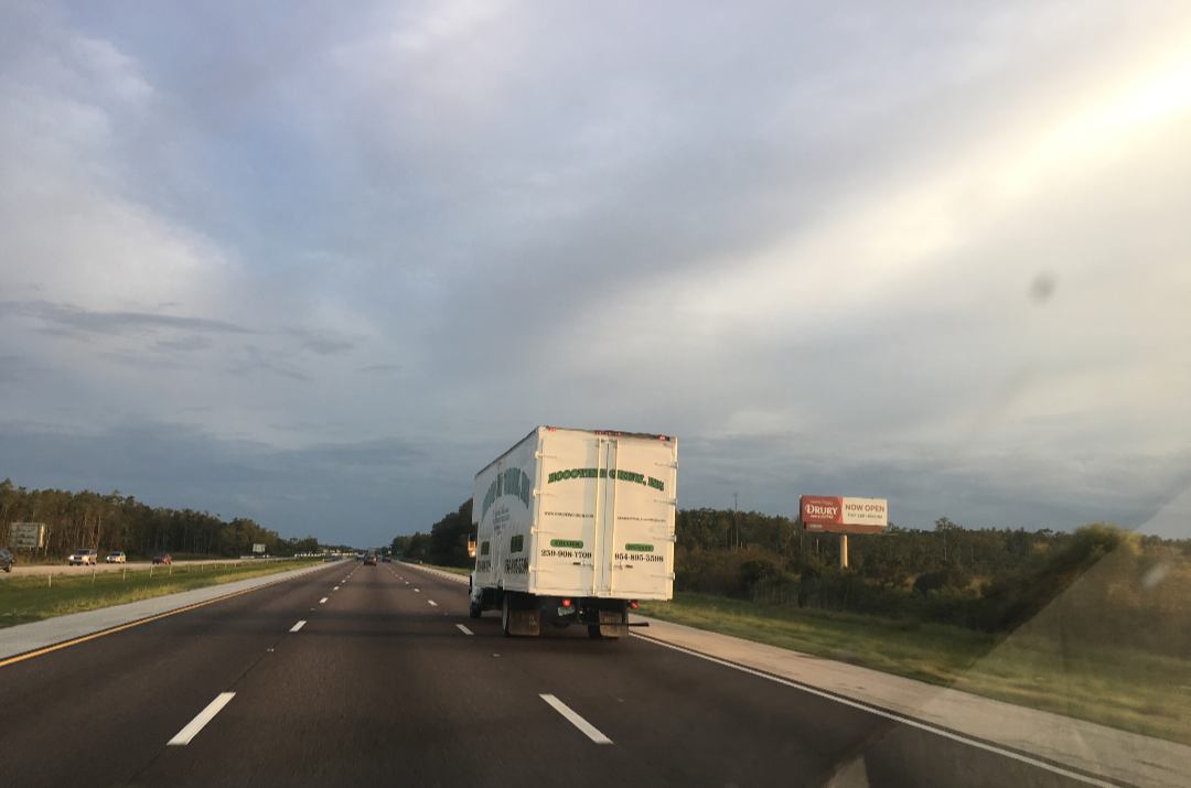 MOOOVING CREW van at Florida property